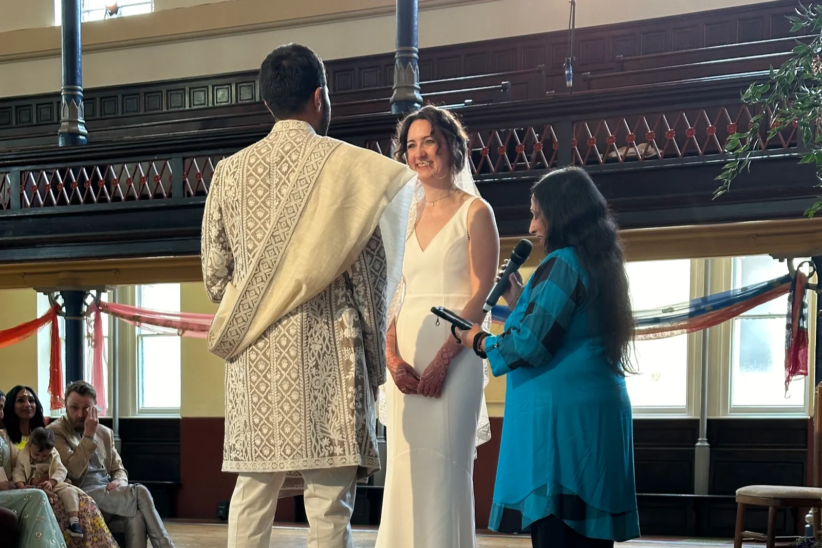 couple and celebrant at multicultural ceremony