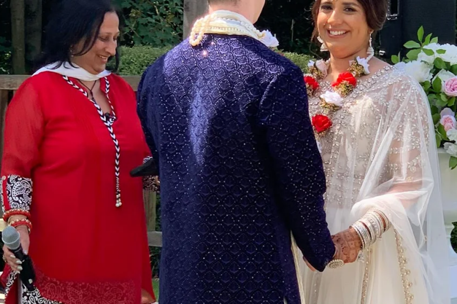 bride smiling during wedding ceremony